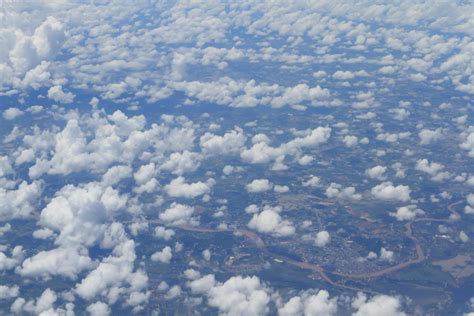 Aerial view of peaceful earth covered in clouds 10326612 Stock Photo at ...