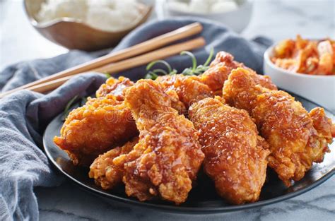 Crispy Fried Korean Chicken Wings In Soy Garlic Sauce With Pickled