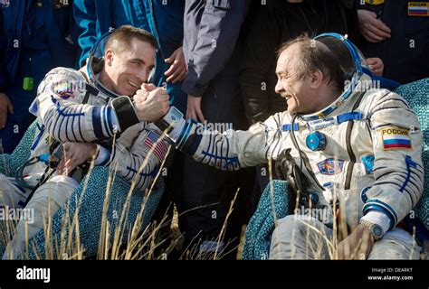 Nasa Expedition 36 Flight Engineer Chris Cassidy Left And Commander Pavel Vinogradov Of