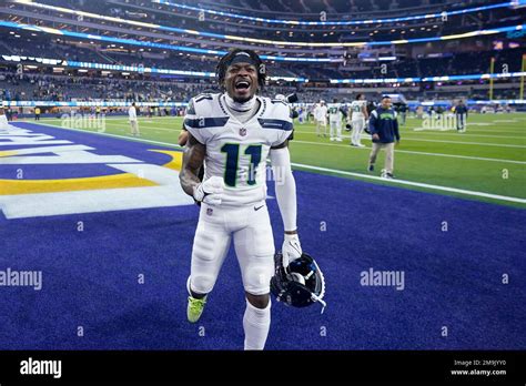 Seattle Seahawks Wide Receiver Marquise Goodwin Celebrates As He Leaves The Field Following An