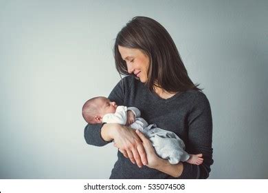 Woman Holding Newborn Mom Baby Close Up Stock Photo