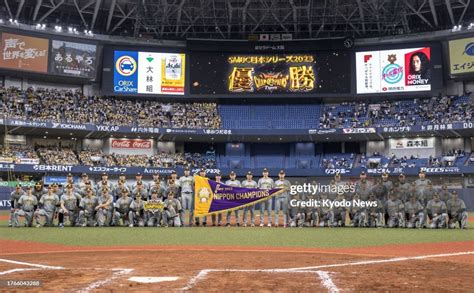 Hanshin Tigers Players Pose For A Team Photo With The Japan Series