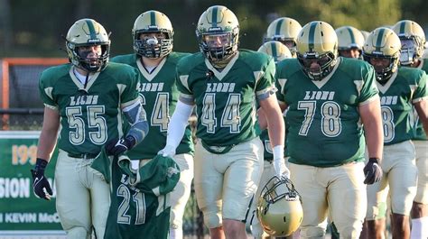 Longwood football team plays with heavy hearts - Newsday