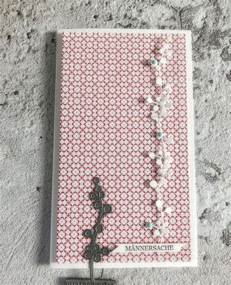 A Book With Beads And A Cross On The Cover Sitting On A Carpeted Floor