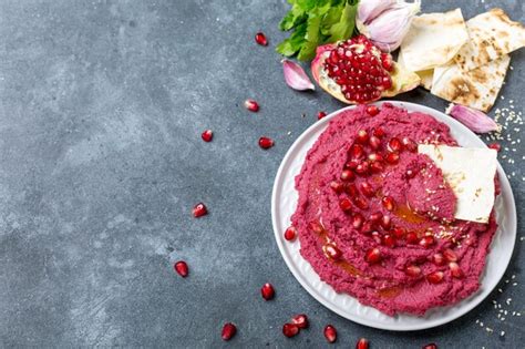 Premium Photo Beet Hummus Dip With Pita Bread