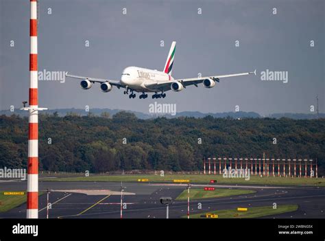 Düsseldorf Airport aircraft landing on the main runway Emirates