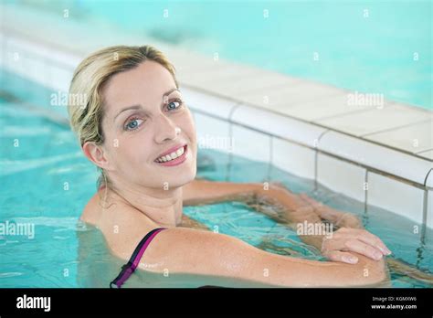 Blond Woman Relaxing In Spa Pool Stock Photo Alamy