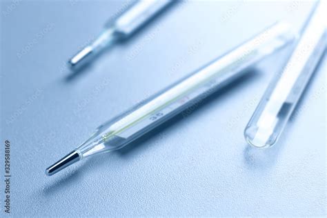 Closeup Of Three Medical Mercury Thermometers Stock Photo Adobe Stock