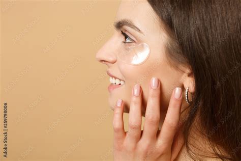 Close Up Half Naked Woman 20s With Perfect Skin Nude Make Up Patches Under Eyes Isolated On