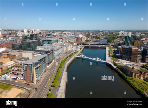 Aerial View From Drone Of Glasgow City Centre Skyline Along River Clyde