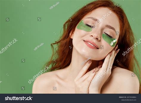 Beautiful Relaxed Half Naked Topless Redhead Stock Photo