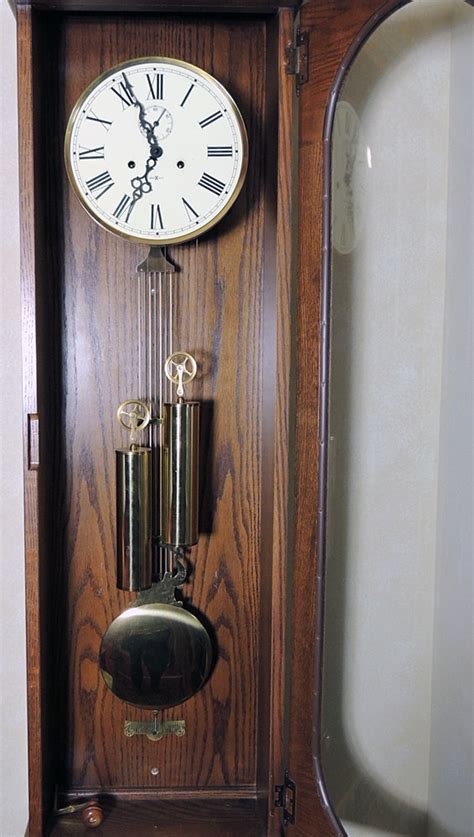 Howard Miller Pendulum Chiming Wall Clock Ebth