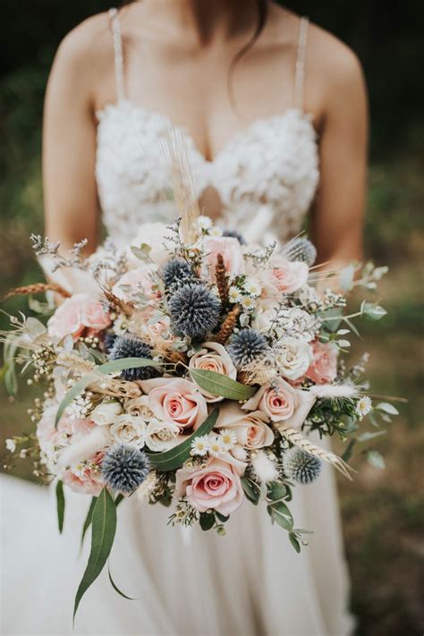 blue thistle and rose bouquet in 2024 | Blush pink wedding flowers ...