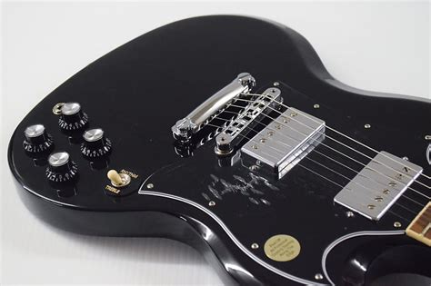 Стандартная электрогитара Gibson SG - черное дерево SG Standard ...