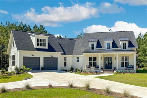 Sophisticated Modern Farmhouse Plan With Angled Garage 51840HZ