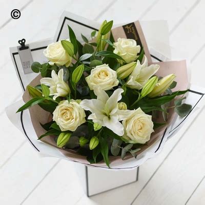 White rose and lily bouquet – buy online or call 01698 760200