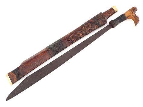 At Auction Antique Indonesian Tribal Mandau Sword Fine Carved Grip