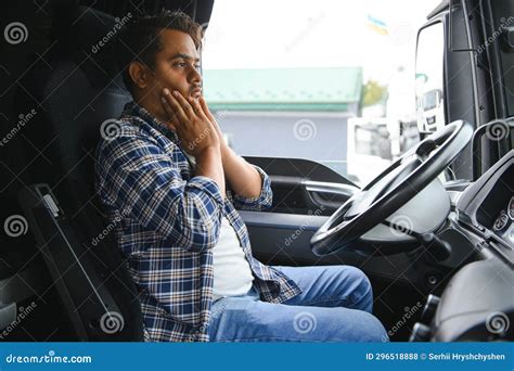 Portrait Of Tired Indian Truck Driver Feeling Sleepy And Sick Stock