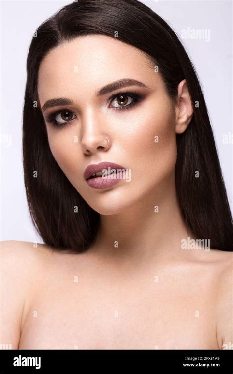 Beautiful Brunette Girl With A Perfectly Smooth Hair And Classic Make Up Beauty Face Picture