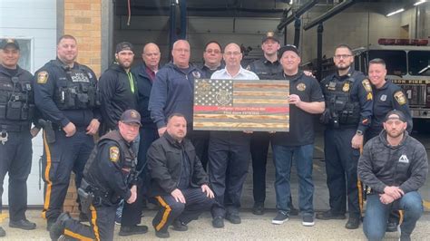 Harrison Police Officers Honor Harrison Firefighter Vincent Doffont