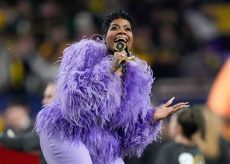 Color Purple Star Fantasia Sings National Anthem At Cfp In Houston