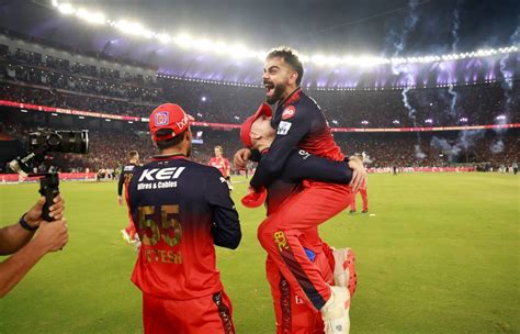 virat kohli lifts ipl  trophy  rcb secure historic