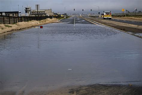 Flooded PCH in Huntington Beach might not reopen until Thursday ...