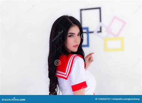 Portrait Of Charming Girl With Perfect Ideal Skin Touching Her