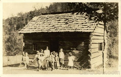 Appalachia - Photo of Family In Front of Rustic Cabin Hillbillies