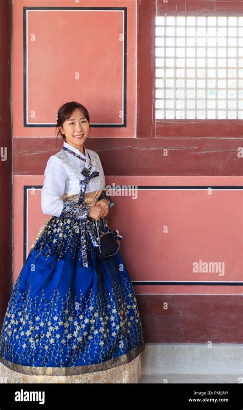 Beautiful Korean woman dressed Hanbok, Korean traditional dress, in ...