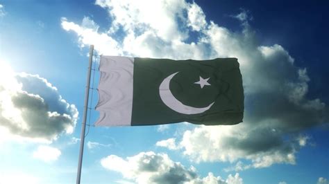 Premium Photo | Flag of pakistan waving at wind against beautiful blue ...