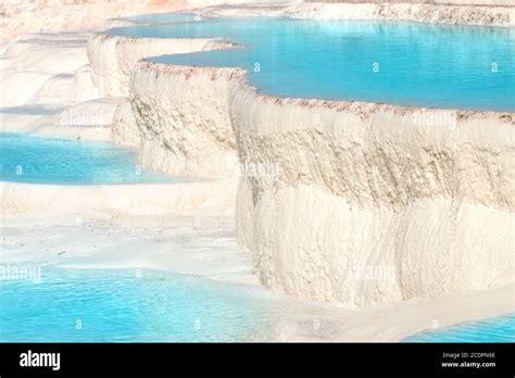 Natural travertine pools and terraces, Pamukkale, Turkey Stock Photo ...