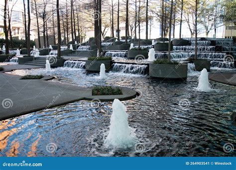 Beautiful Small Fountains with Waterfalls in the Park. Fountain Place, Dallas, Texas, USA ...