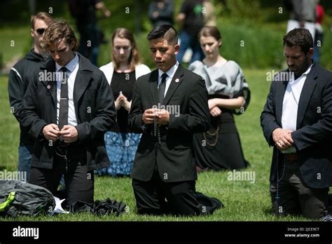 A Group Of Traditional Catholics Pray The Rosary In Coeur Dalenes