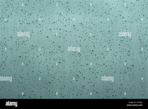 Rain droplets on a window Stock Photo - Alamy