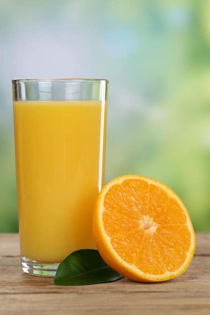 Premium Photo | Orange juice and oranges fruit