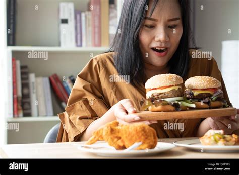 Obese Woman Eating Fast Food Chicken Hi Res Stock Photography And