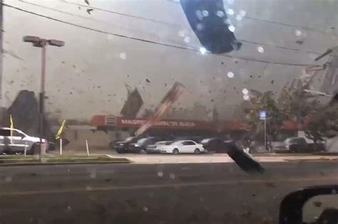 Roof Torn Off Debris Flies Onto Roadway During Brutal Storm