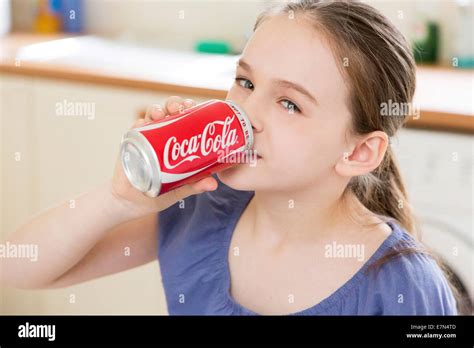 Young Girl Drinking Can Of Coca Cola Stock Photo 73608877 Alamy