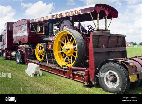 Old Steam Traction Engine On Low Loader Arriving At An English Show