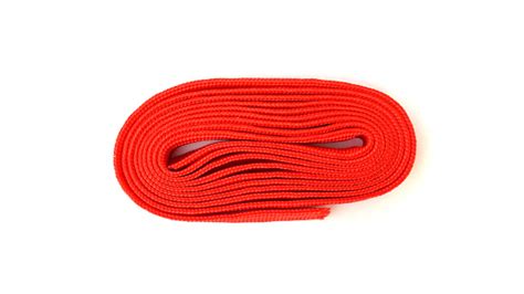 Fabric Rope In Red Color Folded In A Coil Red Rope On White Background