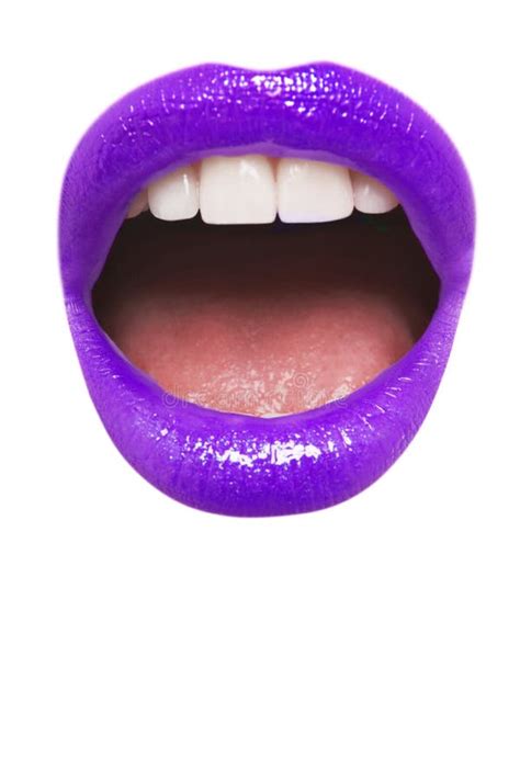 Close Up View Of Female Wearing Purple Lipstick With Mouth Open Over