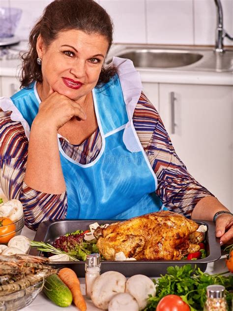 Mature Woman Preparing At Kitchen Stock Photo Image Of Cooking Mother