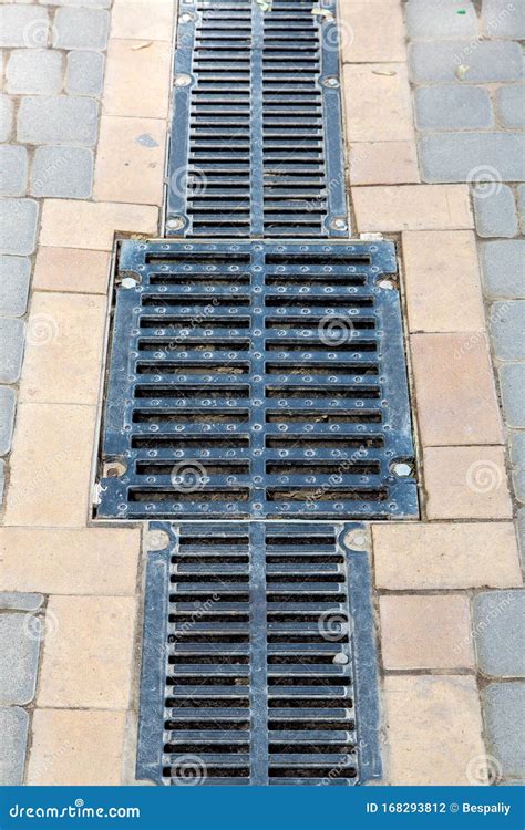 A Lattice Of A Drainage Paving System With Hatch Grill Stock Photo