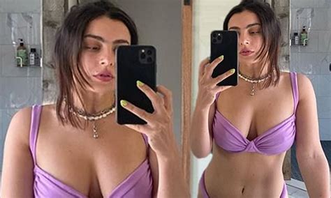 Charli Xcx Shows Off Her Figure In A Plunging Purple Bikini Daily Mail Online