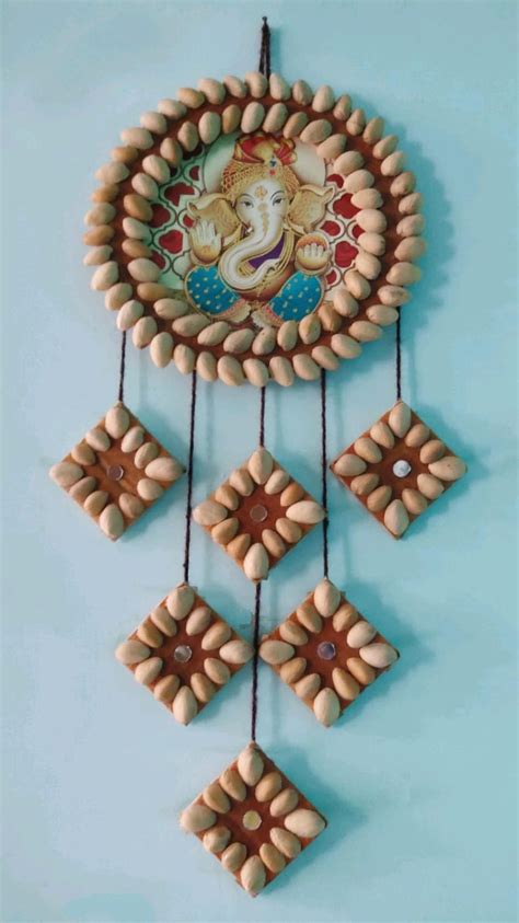 Diy Pista Shell Wall Hanging With Ganesh Ji Shell Crafts Diy Craft