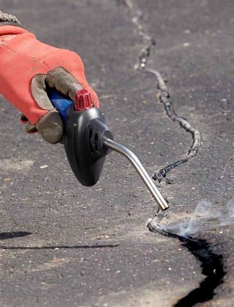 Crack Sealing Preventing Costly Asphalt Damage We Do Lines