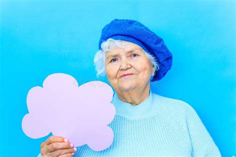 Beautiful Mature Years Old Woman In Blue Beret And Woolen Sweater