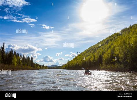 Woman Packrafting Down Beaver Creek National Wild And Scenic Rivers