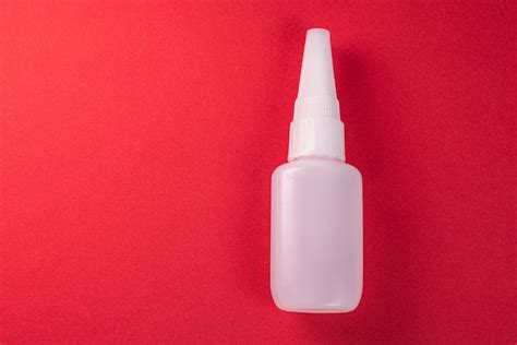 Free Photo | Close up details of a glue bottle isolated